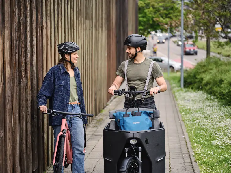 Gespräch auf dem Fahrrad | Presse Downloadbereich